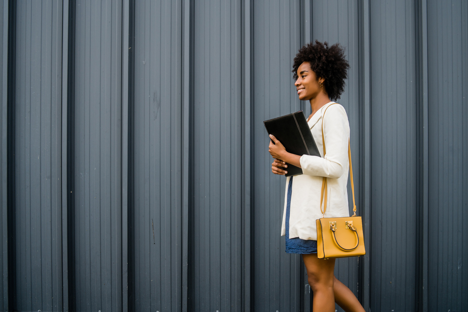 Young Businesswoman Walking in the City 